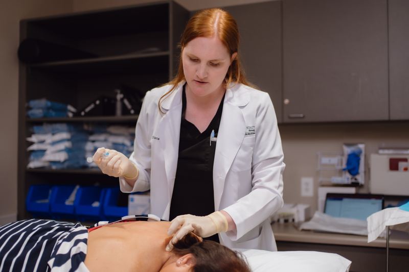 Dr. McShane performing a fluoroscopic-guided spine injection
